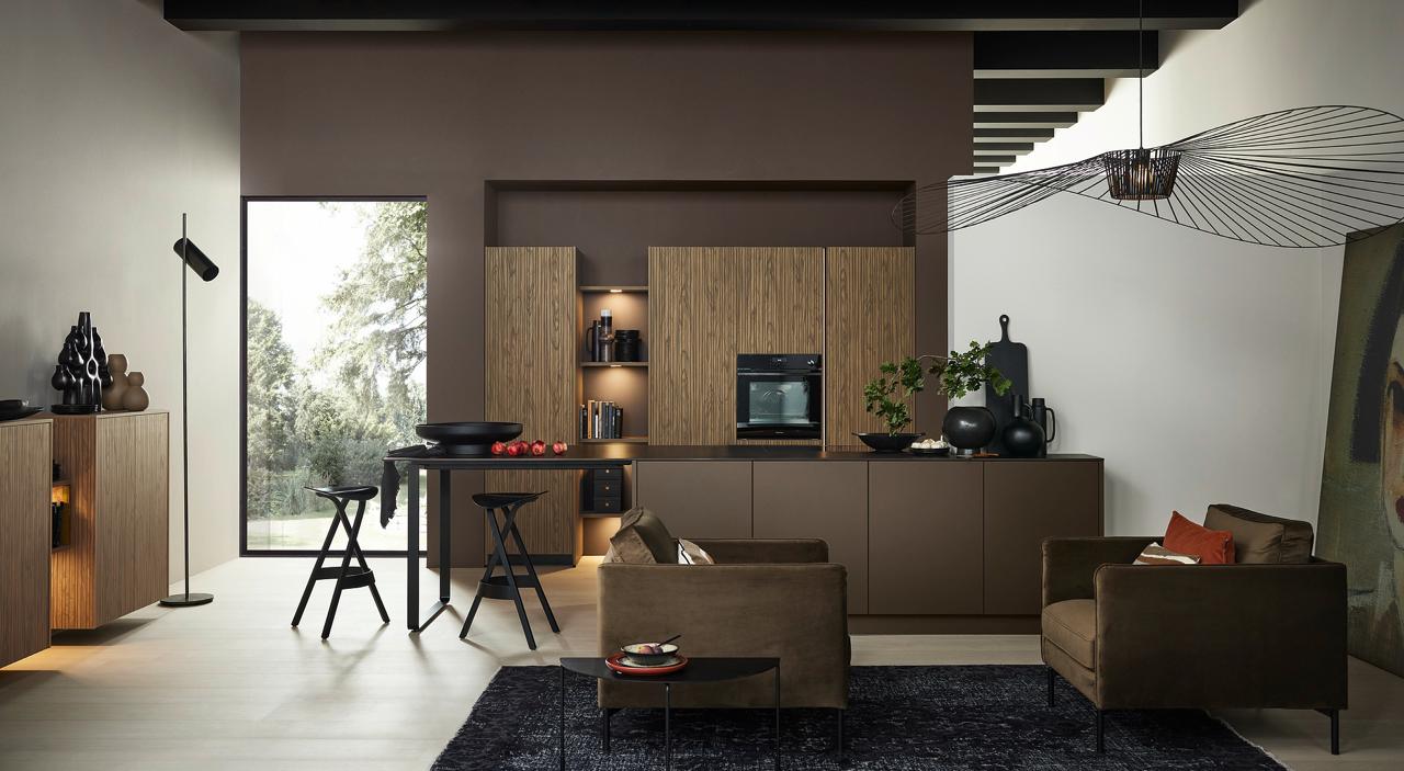 Real Nolte kitchen installed by Adria Maison in Montenegro, open-plan living and kitchen in warm brown tones